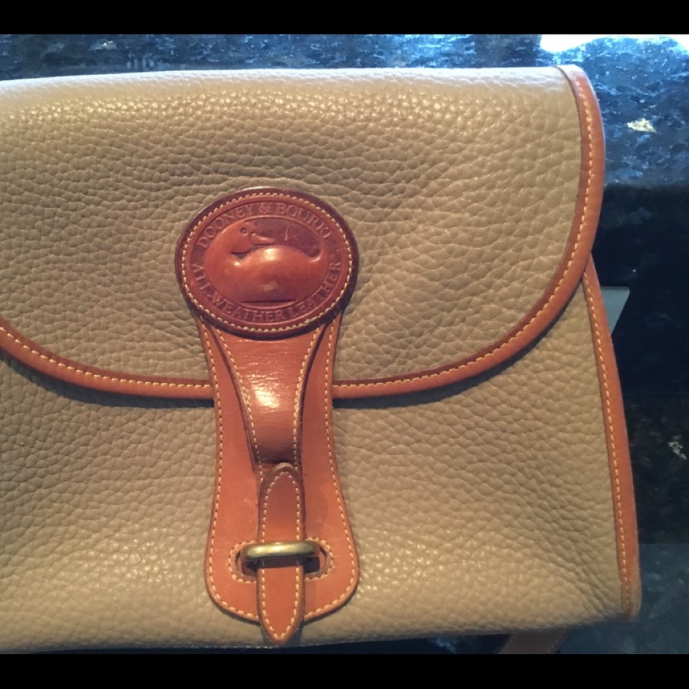 Dooney & Bourke tan and brown.  Great condition